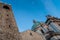 View from below of the medieval tower of town hall Broletto and the New Cathedral of Brescia