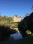 View of Biddulph Grange palace from the bottom of the lake.