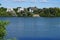 View of the Biesdorfer Baggersee lake with magnificent vegetation in August. Berlin, Germany