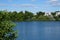 View of the Biesdorfer Baggersee lake with magnificent vegetation in August. Berlin, Germany