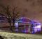 View on Big Four Bridge and Ohio river in Louisville at night with colorful illumination in spring