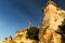 View of the Bizarre rock formations in the GÃ¶reme Valley between the rocks. Sandy desert landscape.