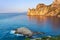 View of Black Sea bay with rock in water with splashing waves