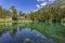 View of Blausee The Blue lake in Bernese Oberland, famous tourist destination in Switzerland