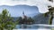 View of Bled Lake, Bled island with small pilgrimage church, mountains in the background, Slovenia, Europe. Peace and quiet.