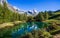 View of the Blue lake Lago Blu near Breuil-Cervinia and Cervino Mount Matterhorn in Val D`Aosta, Italy.