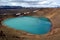 View of the blue Lake Viti on a background of snowy peaks in Iceland