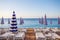 View of the blue striped umbrellas on the beach in Nice, Cote d`Azur, Southern France