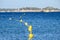 View on blue water of Gulf of Saint-Tropez, sail boats, houses of Saint Tropez, summer vacation in Provence, France