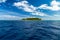 View from boat on sea ocean of tropical paradise maldives island resort with coral reef and turquoise blue ocean tourism blue sky