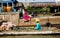 View on boat selling food on river with quonset huts background