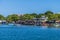 A view from a boat of the shoreline buildings at West Bay on Roatan Island