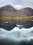 The view of boat on the still water  Waterfall Skye Scotland