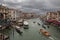 The view of boat traffic using the  Grand Canal, which is the main waterway of Venice that divides the city in two, on a cloudy