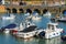 View of boats in the harbour in Folkestone on November 12, 2019. One unidentified man