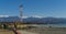 View of border with Abkhazia from Russia side in Sirius village. High tower with radar against Caucasus mountains with snowy