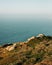 View of boulders on a bluff and the Pacific Ocean, at Point Reyes National Seashore, California