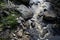 View of boulders in river in wilmington new york wilderness