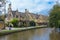 View of Bourton On the Water homes along the canel, a tourist at