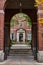 View through brick arches of law student in courtyard of New York City