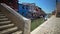 View on brick bridge and beautiful multicolored houses in Burano, architecture