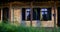 View of brick building with shutters on windows