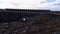 View of the Bridge Between Continents that connects the Eurasian and American tectonic plates over a rock fissure.