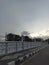 view of the bridge flooding the Semarang canal in the afternoon