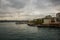 A view of the bridge of the mosque in cloudy weather..Sea front landscape of Istanbul. Tourist Istanbul city landscape. Istanbul