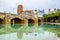 view of the bridge pont del mar over dryed up riverbed of turia river...IMAGE