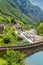 View of Bridge Ponte dei Salti to Verzasca River at Lavertezzo - clear and turquoise water stream and rocks in Ticino - Valle