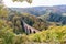 View on a bridge with railroad tracks through the forest in the Eifel mountains, Germany