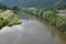 View from the bridge on sedimentary water of river Hron in Slovakia near town Zarnovica.