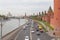 View from the bridge to the Kremlin wall, Kremlin waterfront with traffic, Moscow, Russia.