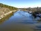 View from the bridge to the river in spring