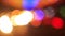 view of bright colourful defocused lights of city illumination