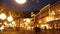 View of bright illuminated promenade of Swiss town of Ascona on winter night during Christmas holidays