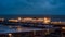 View of Brighton pier floodlit at night