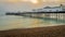 A view of the Brighton Pier on a lovely winter evening just before sunset from the pebble beach