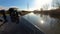 View of a British canal in rural setting from bow of narrowboat