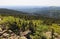 View from Brocken peak over the Harz mountains with its forest and rock formations