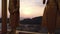 View among Buddha figurine at beautiful colourful sunset sky and mountains in Tiger Cave Temple