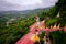 View of buddhist gold pagodas and colorful staircase to Pindaya