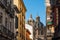 View of the building of the Basilica of Saints Justus and Pastor with street view, Granada, Andalusia, Spain