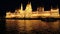 View of the building of the Hungarian Parliament in Budapest from a pleasure boat