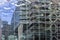 View of the buildings around the Central Station, reflected in the windows on the side of the main building, The Hague, Netherland