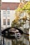 View of buildings by waterway n Bruges