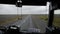 View from the bus. The movement of the bus in the rain on the volcanic desert. Iceland.