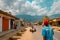 View of a business street in downtown Morogoro with Uluguru Mountains at the background