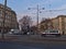 View of busy square Schwarzenbergplatz in the center of Vienna, Austria in the evening with parking police car.